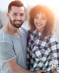 Fototapeta premium happy young couple is hugging each other.