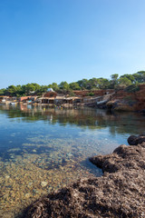 Cala pou des lleo in ibiza with a blue sky