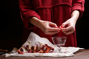  Pomegranate in hands - deseeding
