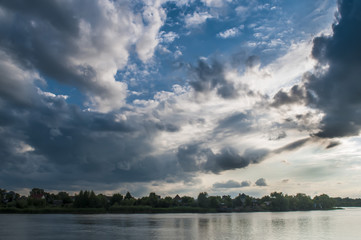 Fototapeta na wymiar Storm clouds over horizon