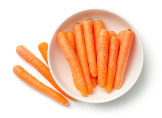 Baby Carrots in Bowl Isolated on White Background