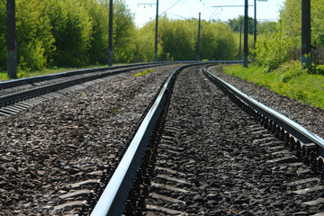 Fototapeta na wymiar Rail lines on a green landscapes of Russia.