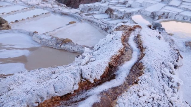 Natural spring inside the salt ponds of Maras, Peru.