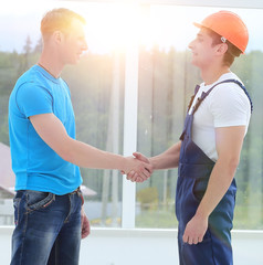Fototapeta premium handshake between customer and foreman
