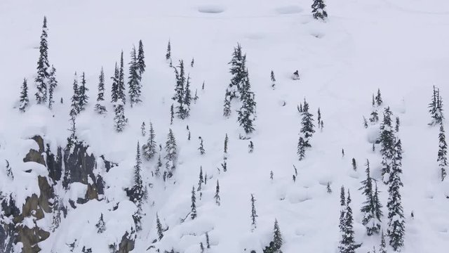 Long shot, skier on British Columbia mountainside
