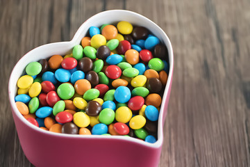 Round candy in a multicolored glaze.