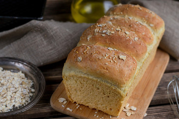 Homemade wheat bread with oats and sesame seeds
