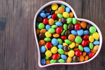 Round candy in a multicolored glaze.