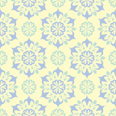 Floral beige seamless pattern. Beige background with light blue and green flower designs
