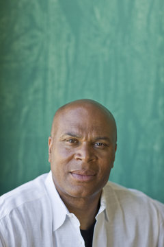 Portrait of a bald mid-adult man.