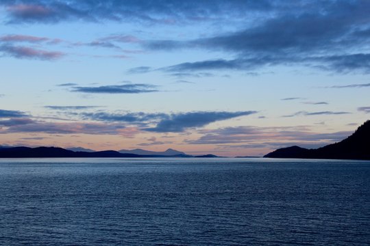 Colorful sunrise with clouds over the bay