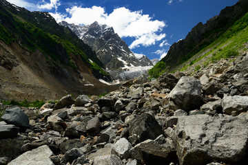 Fototapeta na wymiar A front part on the Chalaadi glacier in the Caucasus, Georgia