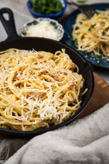 Spaghetti carbonara with egg and pancetta