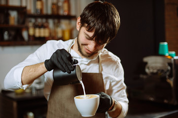 Barista Pouring Milk