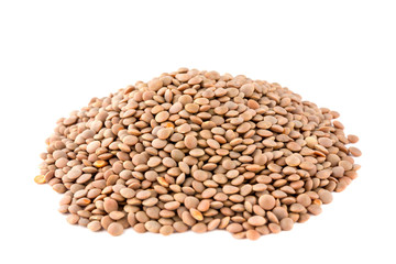 A pile of brown lentils on a white background. Brown lentils piled with a slide on a white background.