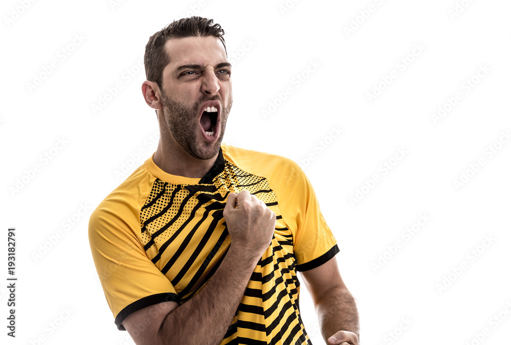 Wall mural Soccer fan with yellow shirt celebrating on white background