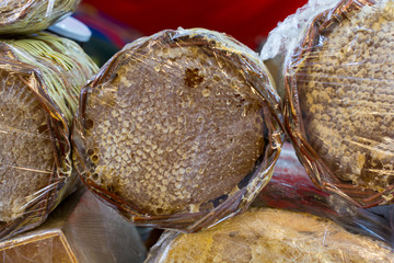 Fresh honey in the sealed comb frame