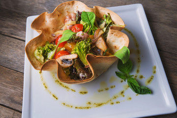 vegetable stew with meat and mushrooms in tasty dishes