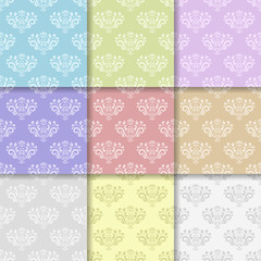 Wallpaper set of colored seamless patterns with floral ornaments