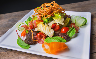 salad with meat, dried squid and vegetables