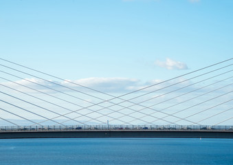 The new Queensferry Crossing Bridge, viewed from the west footpath of the old Forth Road Bridge, showing the cable-stayed construction..