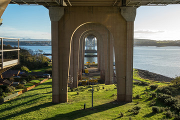 A view along the underside of the old Forth Road Bridge, looking south from North Queensferry, Fife.