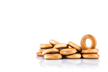 Bagels on white background, shadows and reflections, place for text, template for label