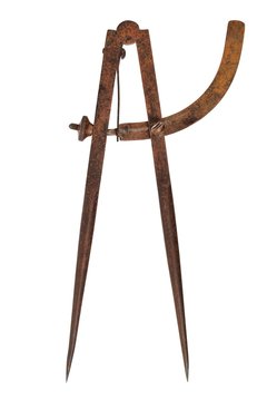 Steel compasses on white