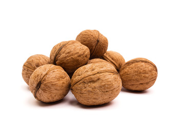 Group of walnuts on white. Healthy organic food concept.