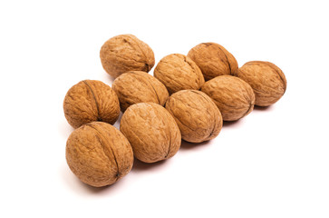 Group of walnuts on white. Healthy organic food concept.