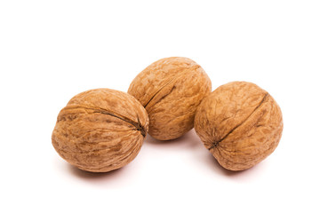 Group of walnuts on white. Healthy organic food concept.