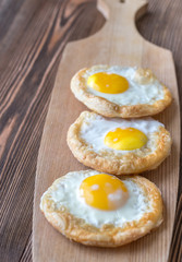 Baked eggs in puff pastry