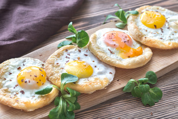 Baked eggs in puff pastry