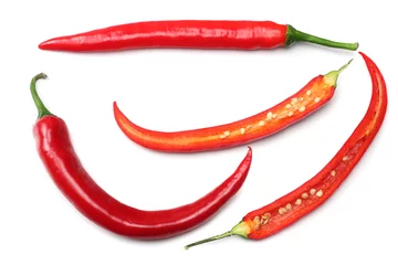 Fotobehang sliced red hot chili peppers isolated on white background top view © Dmytro