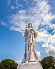 Fototapeta na wymiar Cuba. The Christ of Havana, huge statue of Jesus overlooking to the Old Havana city from hill top in Casablanka area. There is a panoramic viewpoint at the site of the sculpture.