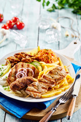 Traditional Greek grill plate with tomato rice