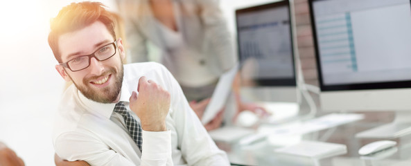 experienced programmer sitting in front of the monitor.