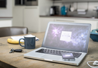 Laptop and Smartphone on Kitchen Table Mockup 1