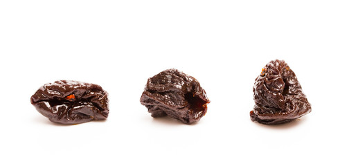 Dried Prunes on a White Background