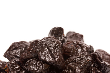 Dried Prunes on a White Background
