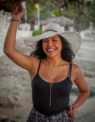 Latina woman on holiday at the beach 