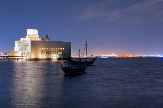 Boats in Doha at night in harbor 