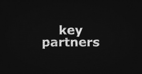 Key partners word on grey background.