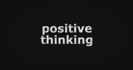 Positive thinking word on grey background.