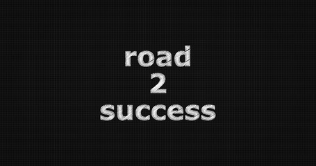 Road 2 success word on grey background.