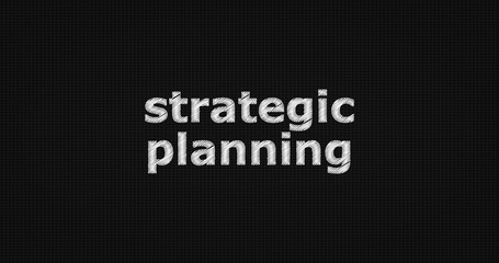 Strategic planning word on grey background.