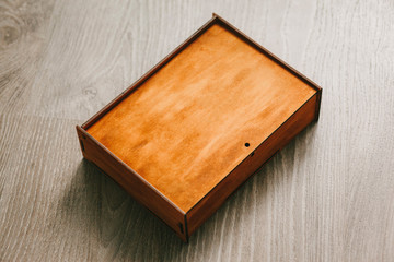 Blank stylish wooden box for gift with space for your inscription.
