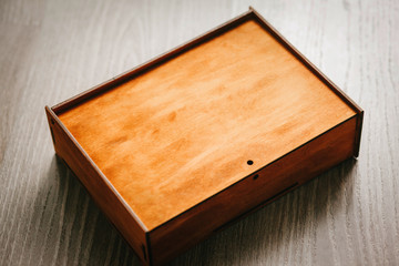 Blank stylish wooden box for gift with space for your inscription.