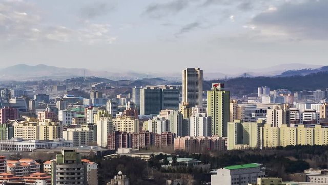 Traveling to North Korea Pyongyang  capital skyline with Ryugyŏng Hotel timelapse