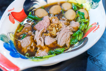 Beef noodles with braised beef and meatball delicious Chinese style Asian favorite food.